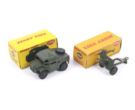 Two Dinky diecast military vehicles. Comprising one Field Artillery Tractor no. 688 and one 25 Pounder Field Gun no. 686, bot