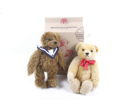 Two teddy bears. Including one Steiff growling bear with a red bow tie and one Deans Edmund bear no. 128 of 200 with a neck t