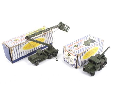 Two Dinky diecast military vehicles. Comprising one Recovery Tractor. No. 661, with green body missing hook, and one Missile 