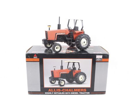 A 1:16 scale diecast Allis-Chalmers 6070 Diesel Tractor model. By Spec Cast, boxed.