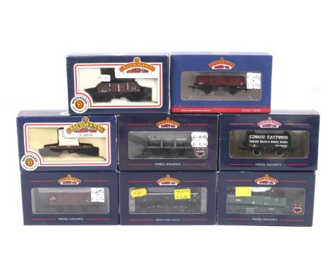 Eight Bachmann OO gauge goods wagons. Featuring ore and mineral wagons etc, all in original boxes.