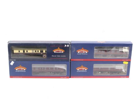 Four Bachmann BR OO gauge Mk1 coaches. In maroon and chocolate and cream, in original boxes.