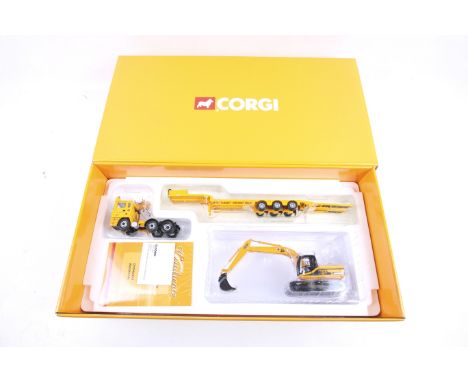 A Corgi 1:50 scale diecast JCB ERF EC Nooteboom Step Frame Trailer and JS220 Excavator. Complete, all in original packaging c