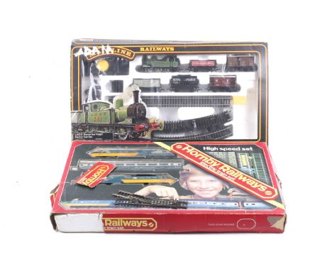 Two OO gauge train sets. Comprising one Mainline LNER freight train set with an 0-6-0 tank engine, wagons and track and one H