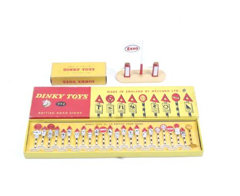 Two Dinky diecast road accessories sets. Comprising one British Road Signs set no. 772 and one Esso Petrol Pump Station no. 7