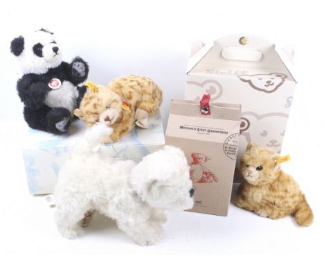 A collection of four Steiff animal teddy bears. Comprising one Treff terrier, one red kitten, one Panda and one kitten, all b