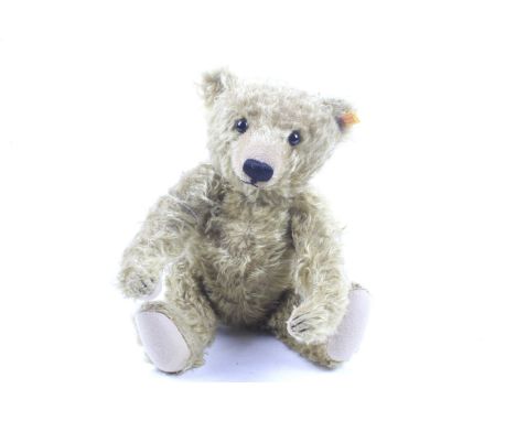 A Steiff classic jonted teddy bear with growler. Fabric label to ear, growler in working order, H44cm. 