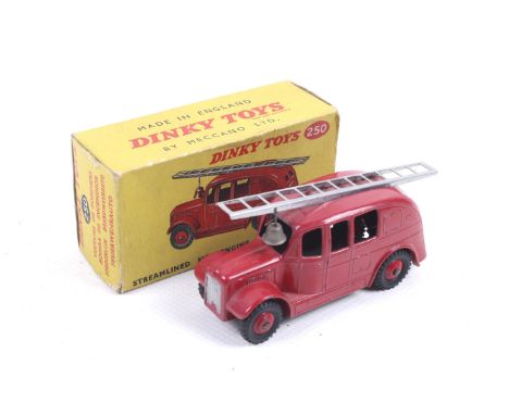 A Dinky diecast Streamlined Fire Engine. No. 250, with red body and chrome ladder, complete with bell, in original box.