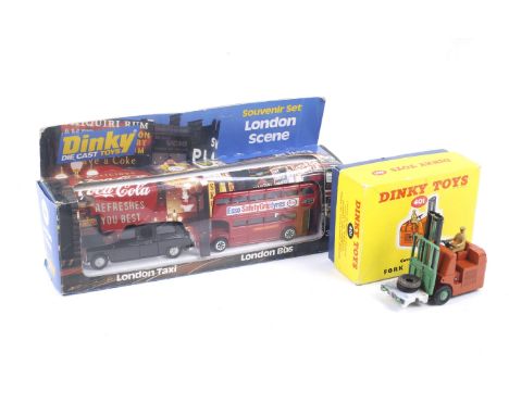 Two Dinky diecast Model vehicles. Comprising one Fork Lift Truck no. 401 and one London Scene including a London Taxi and a B