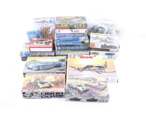 A collection of military themed model kits. Comprising mainly tanks from Italeri and Revell etc. 