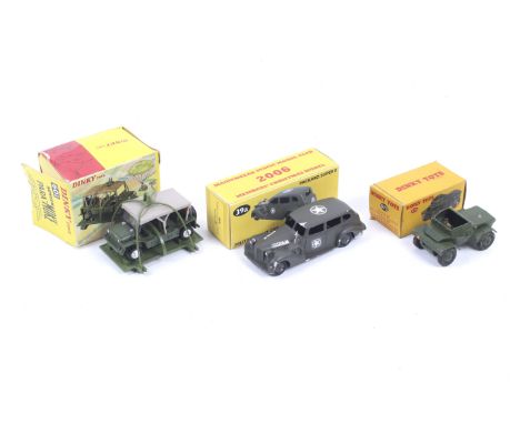 Three Dinky diecast military vehicles. Comprising one Scout Car with driver no. 673, one Austin Para Moke no. 601 (box damage
