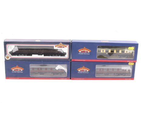 Four Bachmann OO gauge BR Mk1 coaches. In a range of liveries including maroon and chocolate and cream, all in original boxes