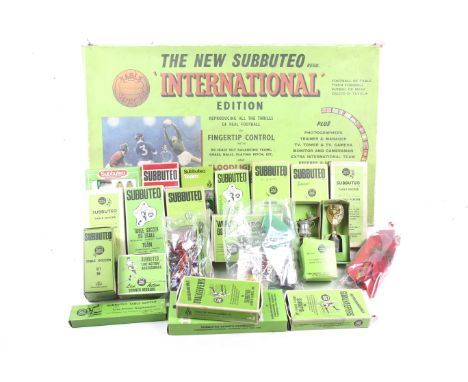 A collection of Subbuteo table soccer game and accessories. Comprising an International Edition boxed set complete and in ori