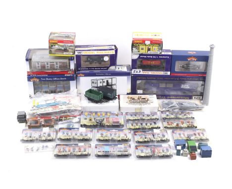 A collection of OO gauge model railway accessories. Mainly Bachmann to include figures, buildings and kits etc, mostly boxed.
