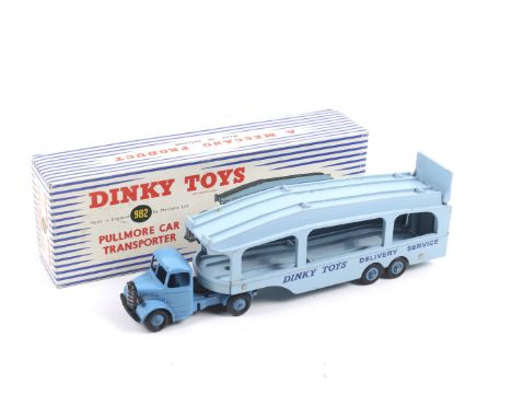 A Dinky diecast Pullmore Car Transporter. No. 982 with light blue ramps on a dark blue truck with dark blue lettering, in ori