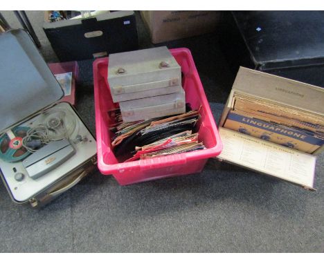 A box of mixed 7" singles including Status Quo, Paul Simon, Judge Dread, The Jackson 5, etc together with assorted language c