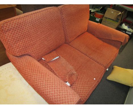 A Marks &amp; Spencer two seater sofa in terracotta coloured upholstery, 145cm long