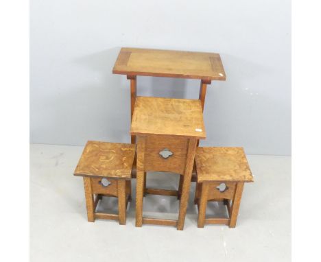 Three matching oak Arts & Crafts style jardiniere stands, and a similar oak table. (4)Dimensions: - table 54x72x30cm - tall p