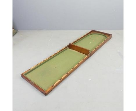 A vintage oak folding Bagatelle board. 46x12x91cm (folded). 
