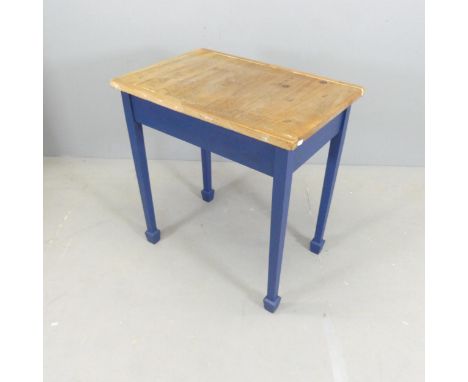 An early 20th century oak table on painted base. 73x77x49cm. 
