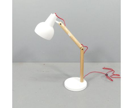 ZUIVER - A contemporary anglepoise desk lamp, with light oak column on metal base. 