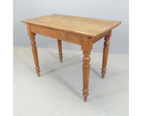 A stained pine kitchen table. 89x72x51cm.