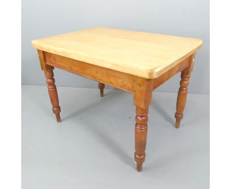 A modern pine farmhouse kitchen table. 103x74x72cm.Good condition. Top has been stripped and may not be original. 