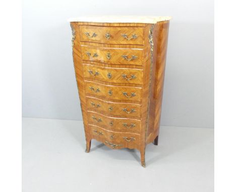 A French Kingwood and satinwood inlaid marble top semainier chest of seven drawers, with brass ormolu mounts and key. 84x140x