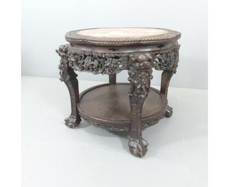 Chinese circular carved hardwood 2-tier table, with inset marble top in carved lobed surround, diameter 62cm 