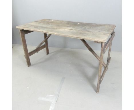 A vintage pine folding trestle table. 136x76x69cm. 
