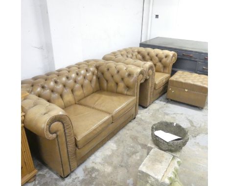 A modern brown button button-back leather upholstered two-seater sofa, with a matching armchair and footstool.Dimensions:- So