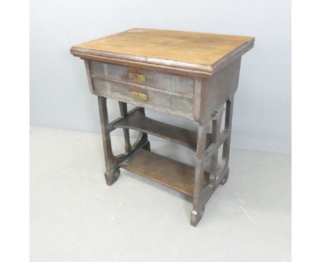 A German Arts & Crafts or Jugendstil oak sewing table with fold-out top and fitted drawer. 65x79x46cm (opening to 92cm) 