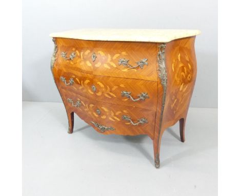 A French Louis XV style kingwood veneered and satinwood strung bombe commode chest of three drawers, with marble top, brass m