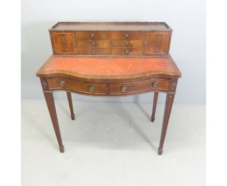 A 19th century mahogany and satinwood strung writing table. 91x96x56cm. 