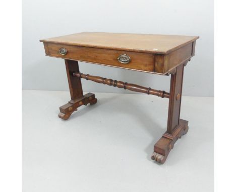 A 19th century mahogany writing table, with single drawer and carved fluted decoration. 104x73x49cm 