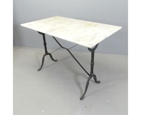 A rectangular marble-topped garden table on cast iron frame. 100x75x60cm.Repair visible to corner. 