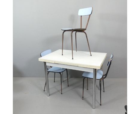 A mid-century Formica topped draw-leaf table, with a set of three similar chairs. 100x75x70cm (opening to 161xm). 