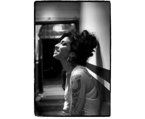 Artist: Amy Winehouse Photographer: Jill Furmanovsky Signed by: Amy Winehouse Size: A2 16.5” x 23.4” (42 x 59.4cm) Union Chap