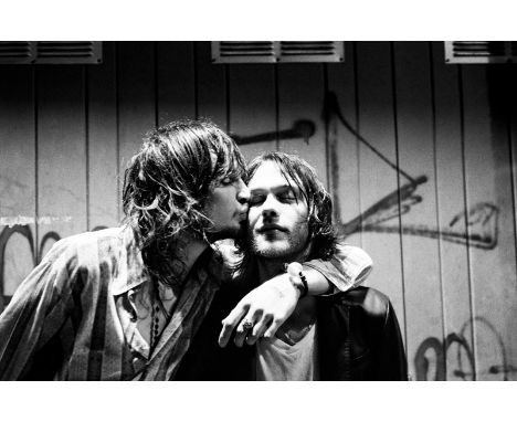 Artist: Kasabian Photographer: Jill Furmanovsky Signed by: Sergio Pizzorno and Tom Meighan Size: A2 16.5” x 23.4” (42 x 59.4c
