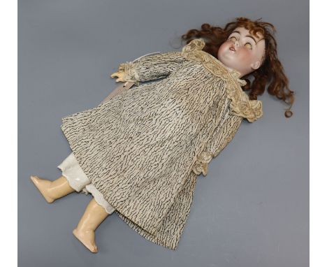 A Kestner 152 bisque head doll, original clothes, height 20in.