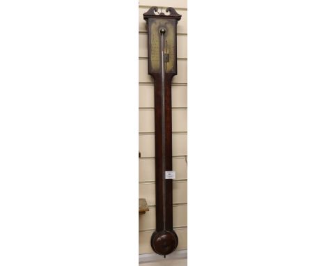 A George III mahogany stick barometer, the engraved brass dial marked Ramsden, London H.96cm