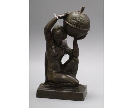 An Art Deco spelter model of a water carrier table lighter height 24cm