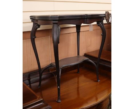 A late Victorian mahogany folding top card table, on cabriole legs W.62cm