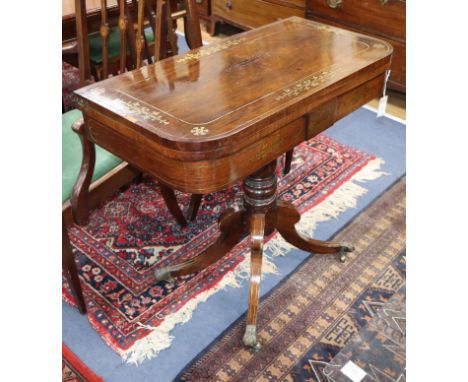 A Regency brass inlaid folding card table W.88cm