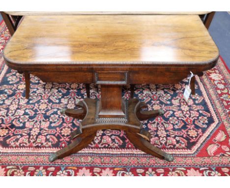 A Regency rosewood folding card table W.90cm