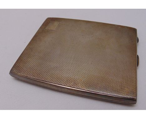 A hallmarked silver engine turned cigarette case, approx total weight 165g
