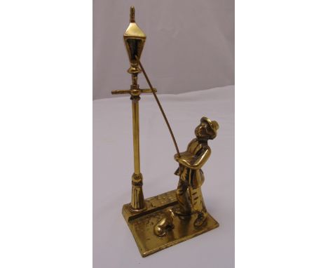 Brass figurine of a lamp lighter with his dog on raised rectangular base, 31cm (h)