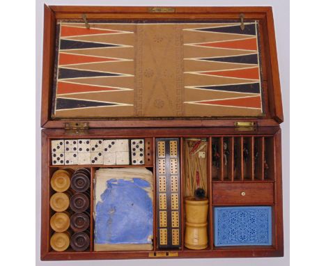 A late 19th century cased games compendium to include backgammon, chess, dominoes, horse racing and drafts