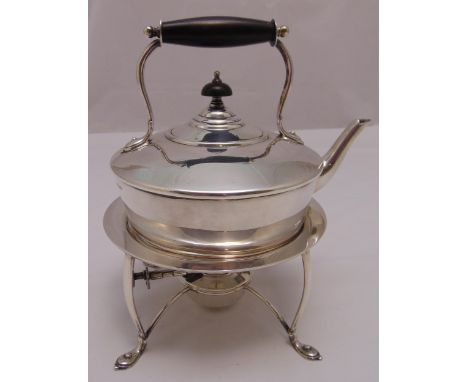 A Mappin and Webb hallmarked silver tea kettle on stand, of compressed cylindrical form with central scroll handle and domed 