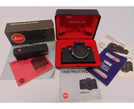 Leica R4 camera in original packaging and a Leica R4 motor winder 14282 in original packaging